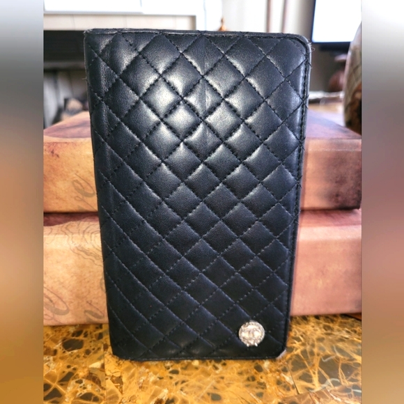 CHANEL Handbags - CHANEL BLACK QUILTED WALLET.